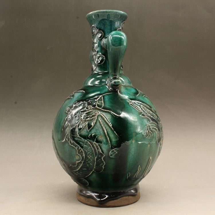 Green glaze relief vase; Feng Shui ornaments