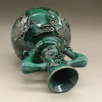 Green glaze relief vase; Feng Shui ornaments